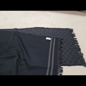 Used authentic Gucci Scarf with GG pattern and Understated reverse